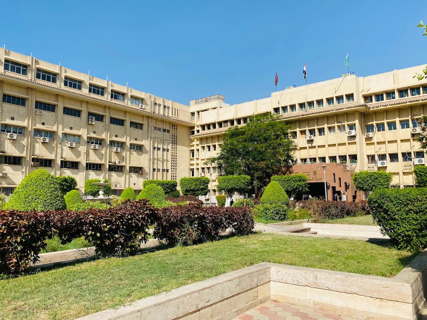 A Kasr Al-Ainy Faculty of Medicine building of the University of Cairo, with its garden