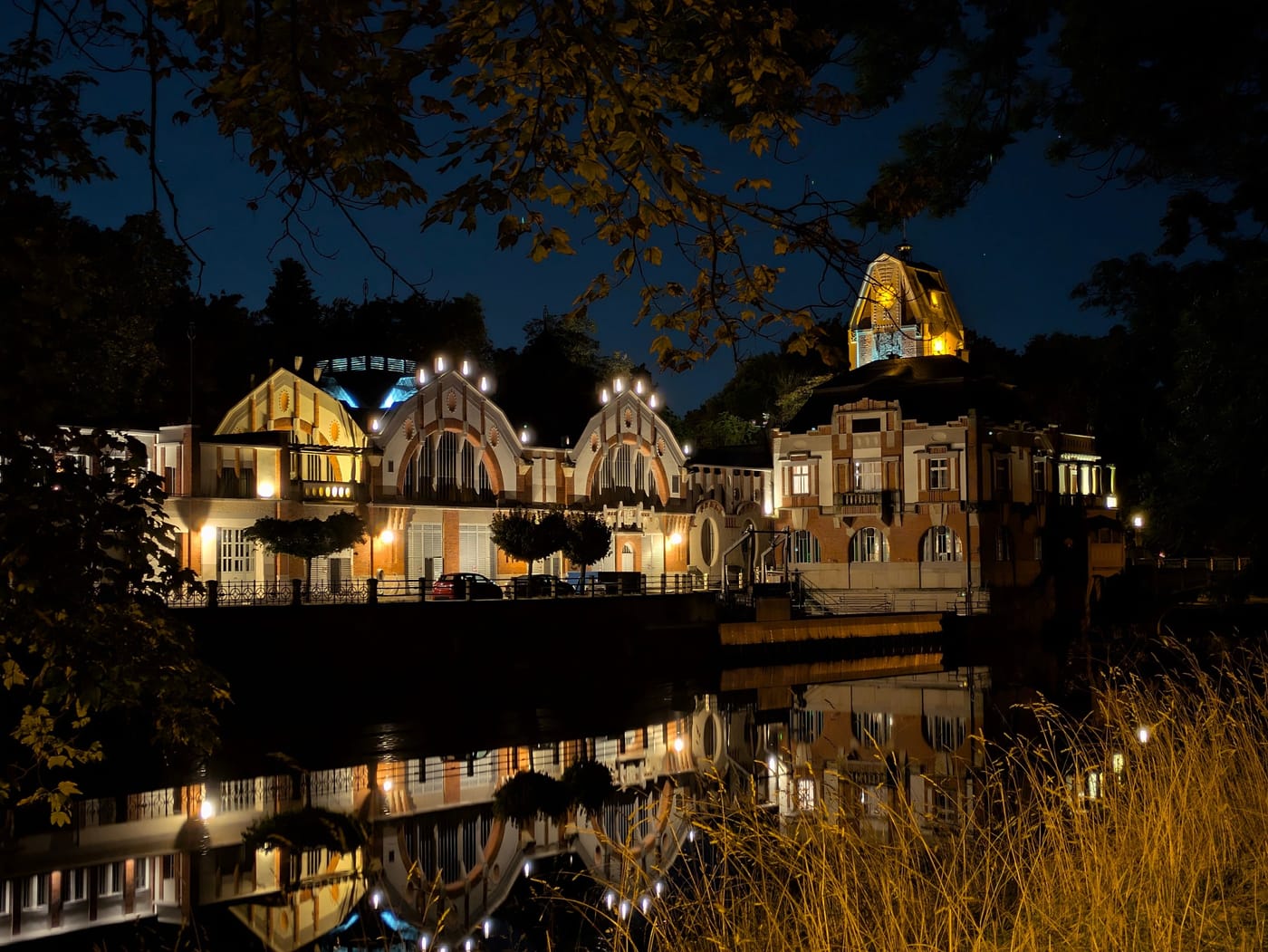 Riverside buildings of Hradec Králové illuminated at night