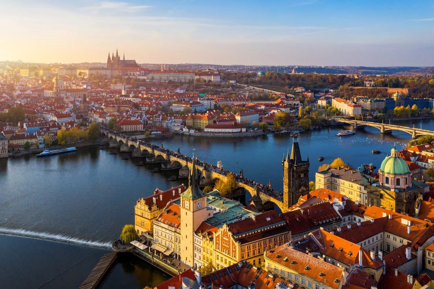 Prague skyline at dawn with the Charles Bridge and the Vltava river