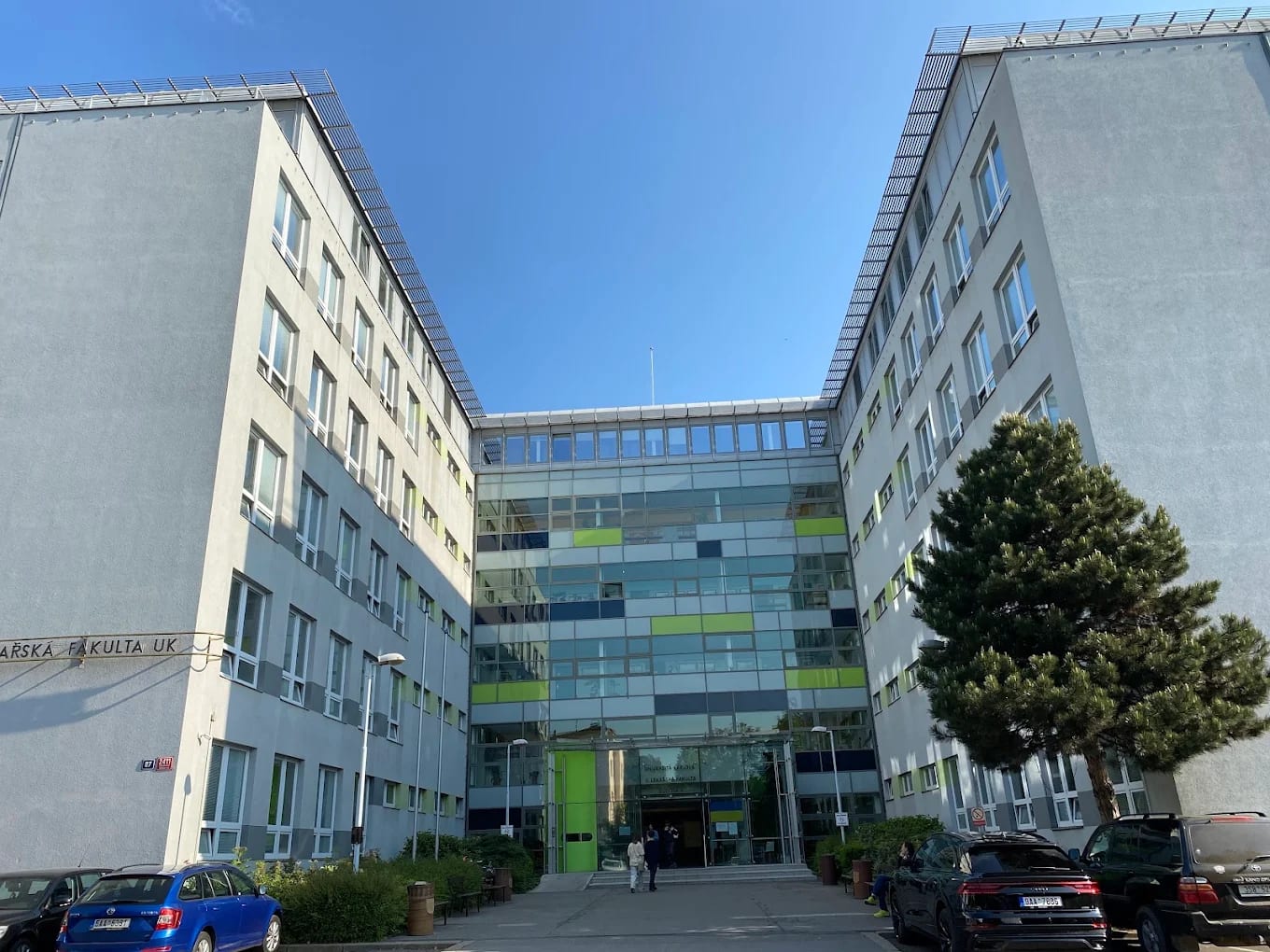 Main building of the Third Faculty of Medicine against a blue sky