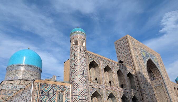 Tiled madrasah and minaret at Registan Square, Samarkand, Uzbekistan