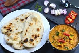Naan with vegetable curry