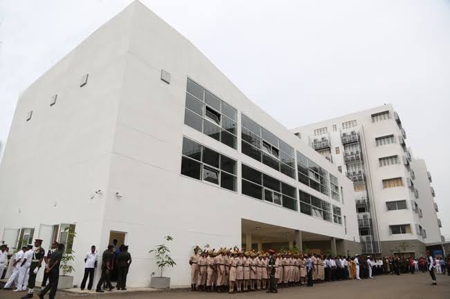 A Faculty of Medicine building at General Sir John Kotelawala Defence University with cadets assembled outside