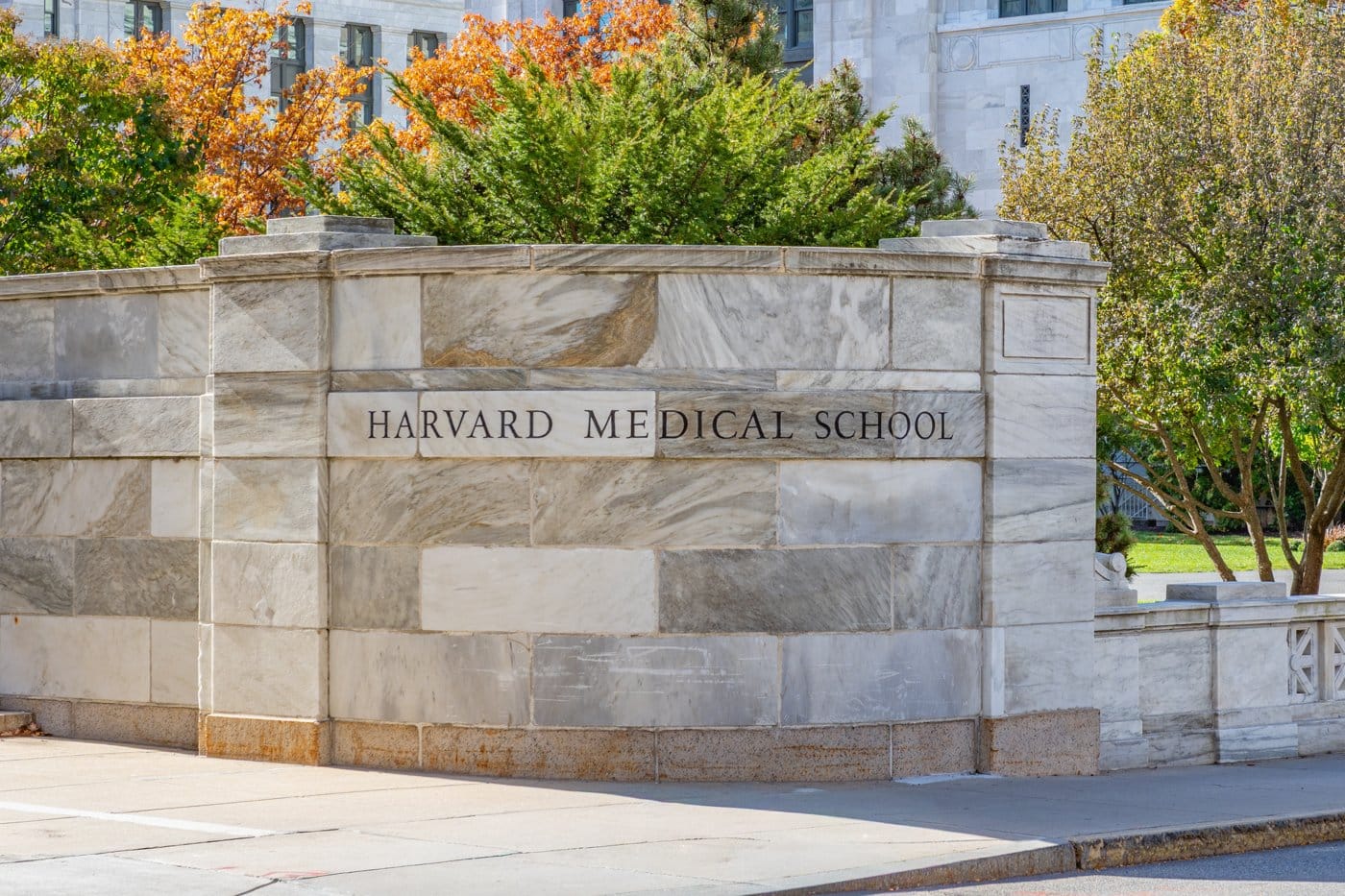 The engraved Harvard Medical School wall sign at the Longwood campus entrance