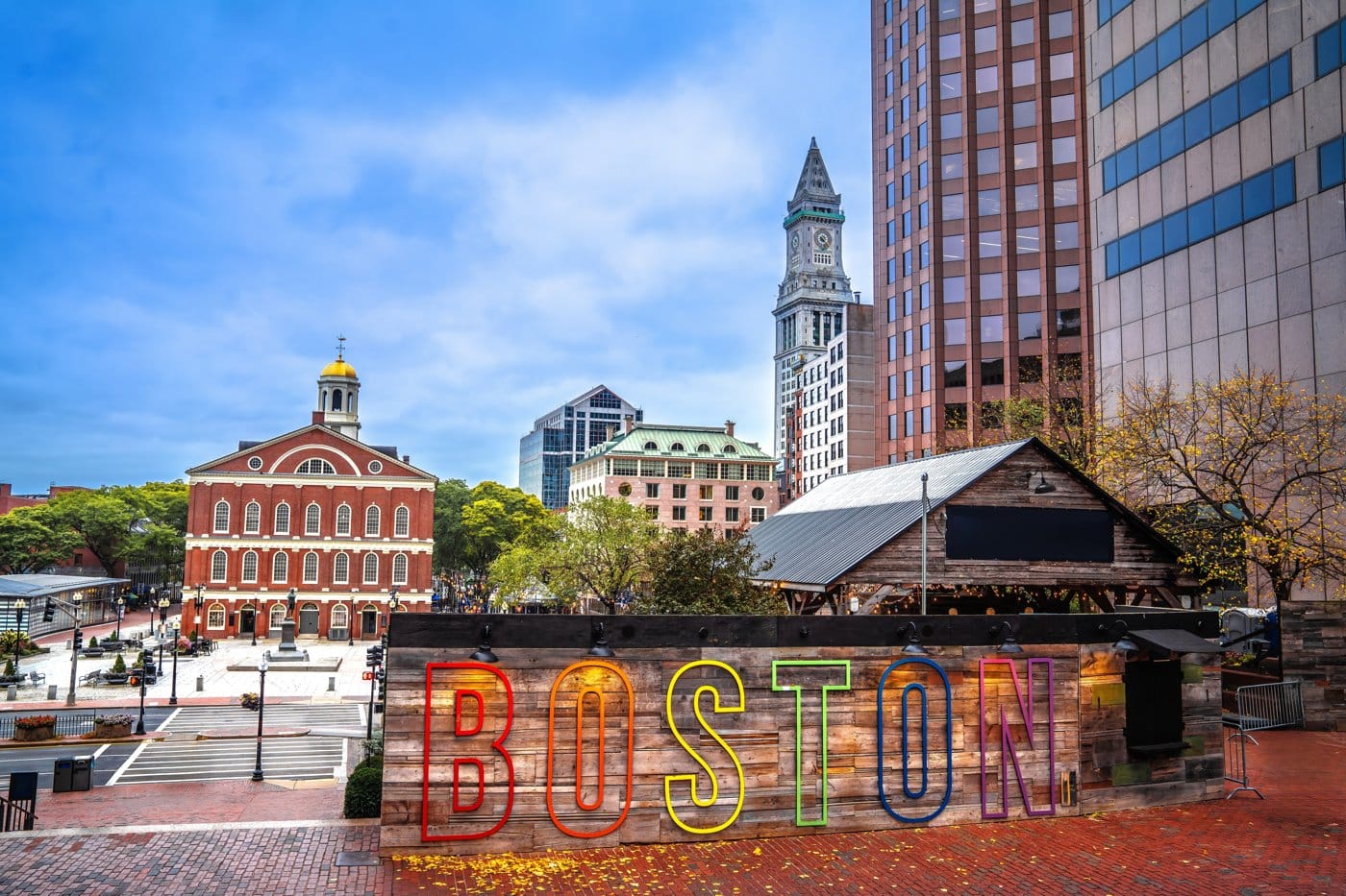 Historic Faneuil Hall and the Boston skyline, near Harvard's teaching hospitals