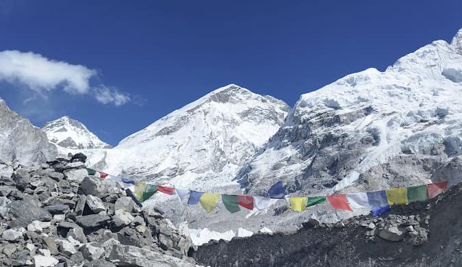 Prayer flags and the Everest region of the Nepal Himalaya (elsewhere in Nepal, not Biratnagar)