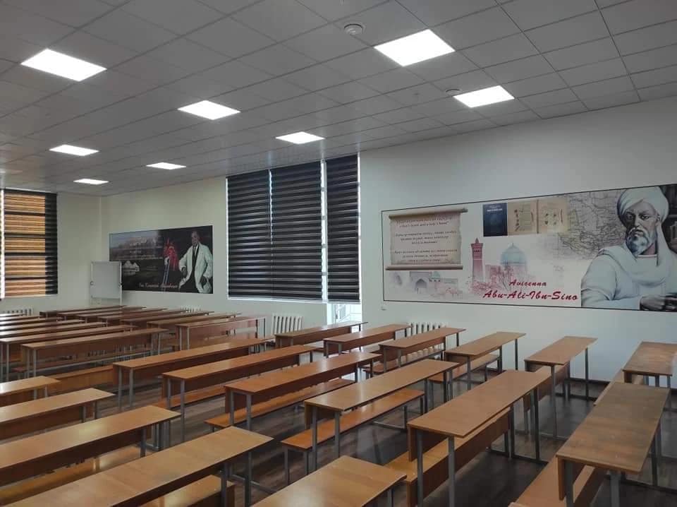 A lecture hall at Osh State University with a portrait of Ibn Sina (Avicenna)