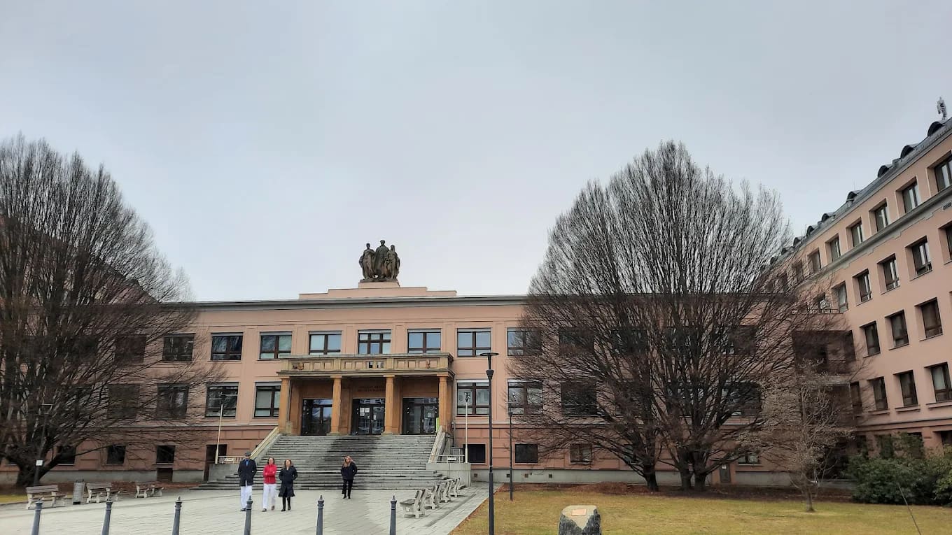 Historic faculty building with statues in Olomouc