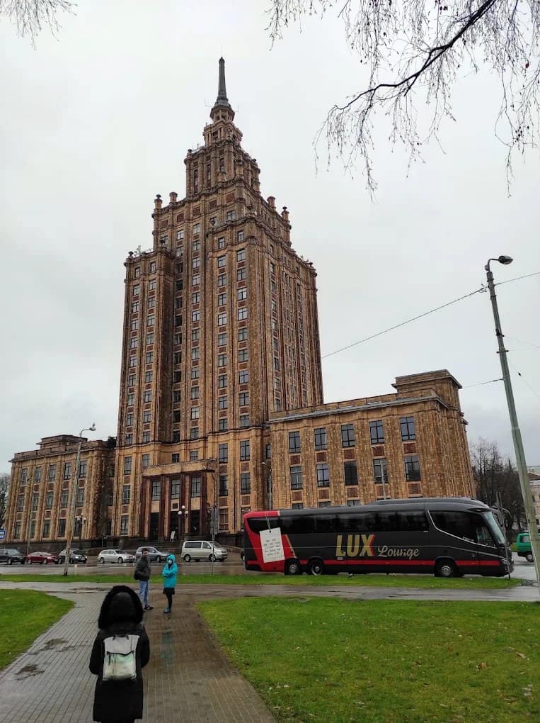 The Latvian Academy of Sciences building and a tram in Riga
