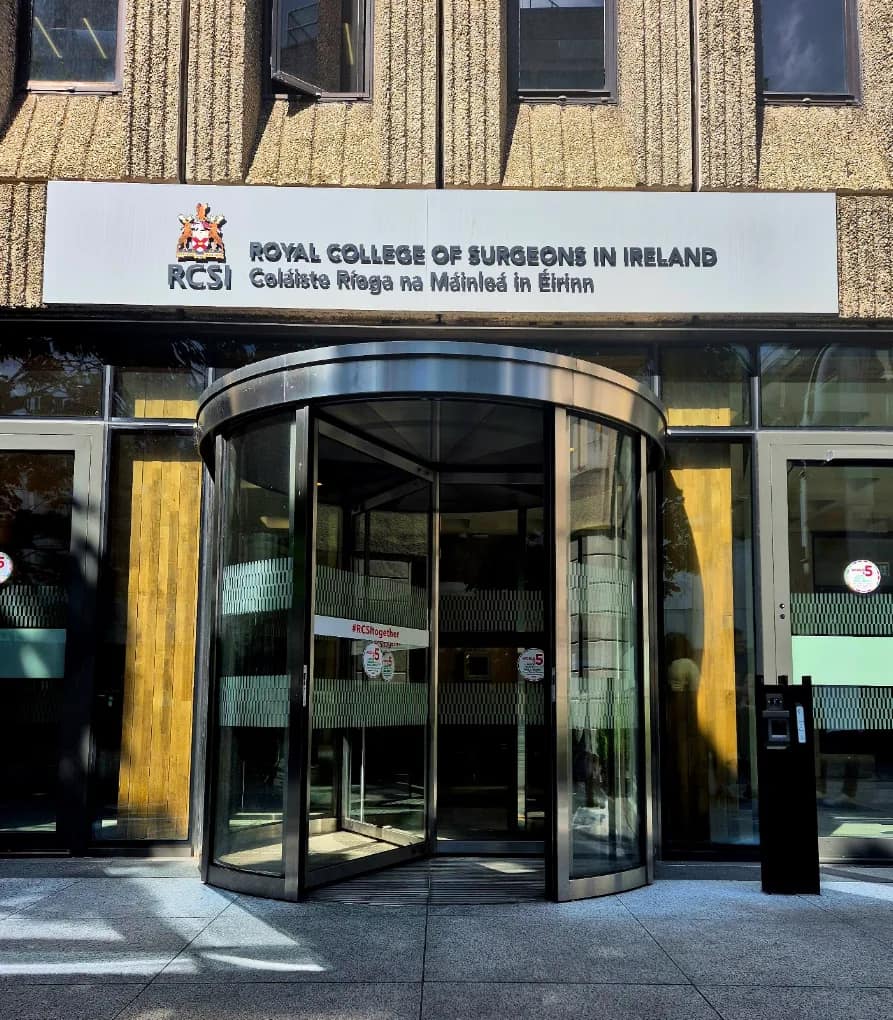 Entrance of the Royal College of Surgeons in Ireland with the RCSI crest and signage