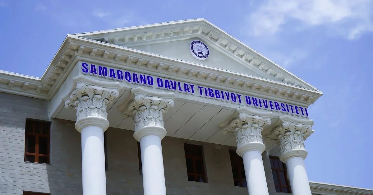 The pediment of Samarkand State Medical University with its name in Uzbek