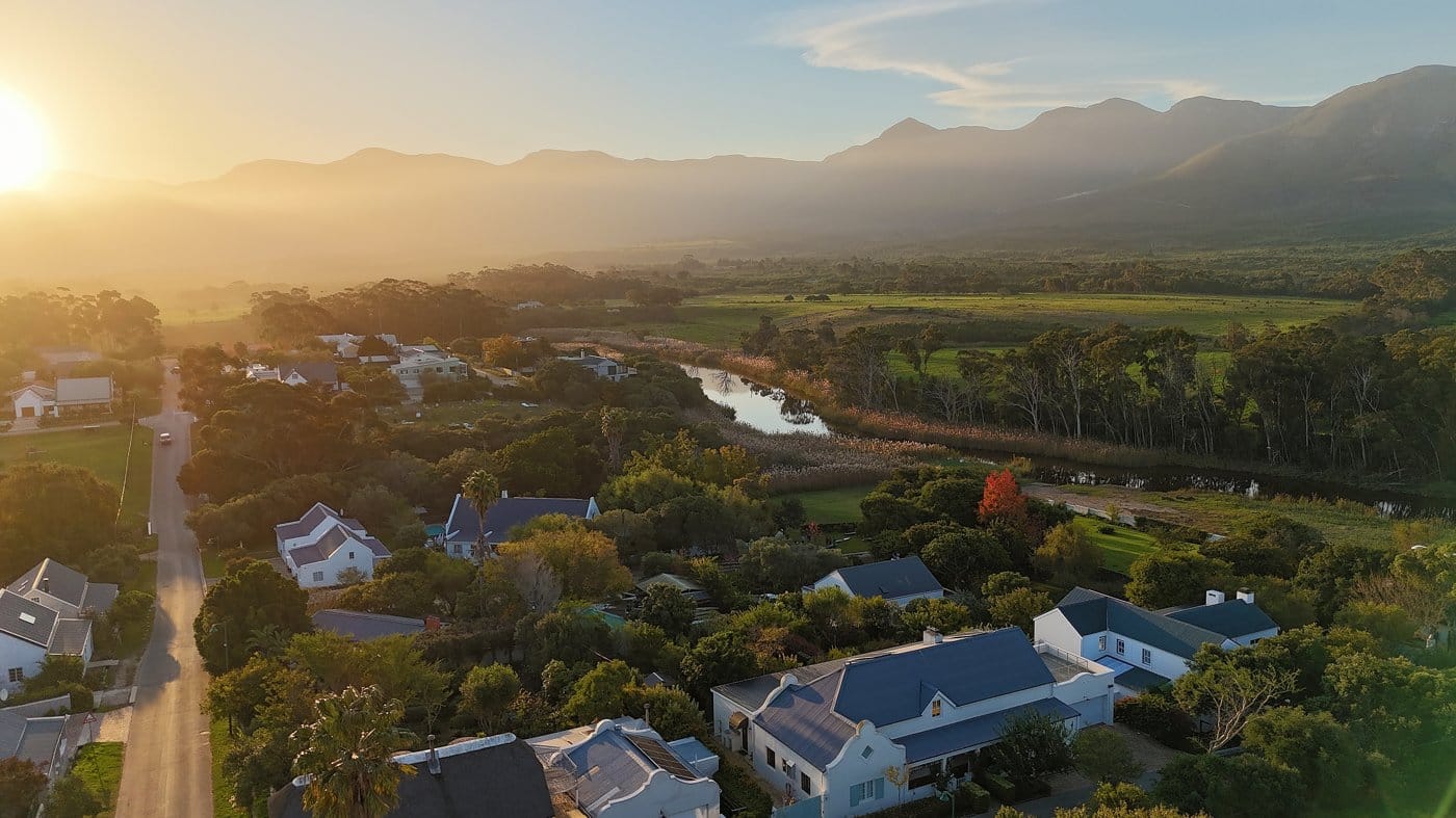 A wide aerial view of the Silicon Valley landscape at sunrise near Stanford