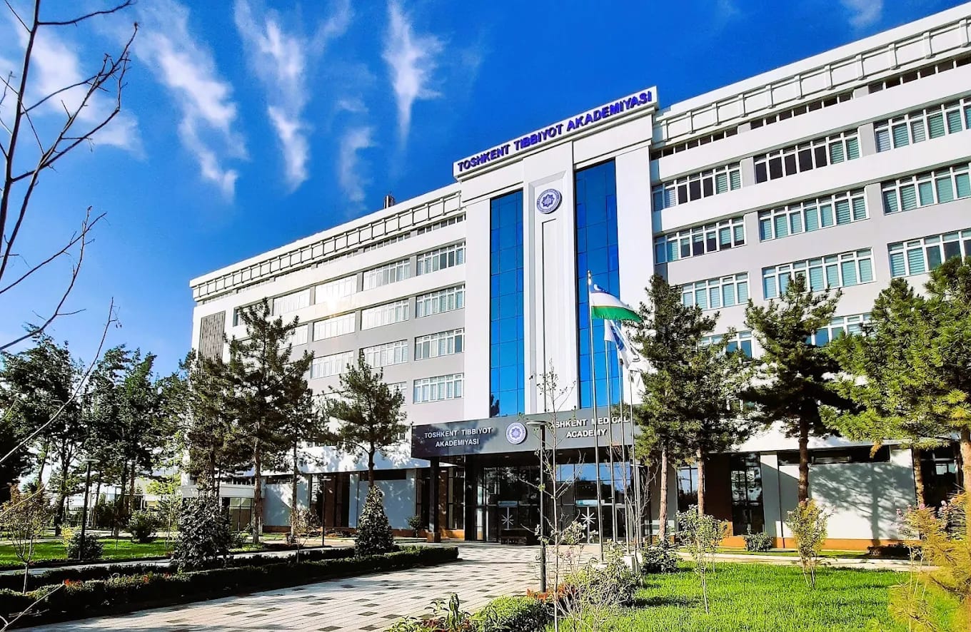 The Tashkent Medical Academy main building with the Uzbekistan flag, Tashkent