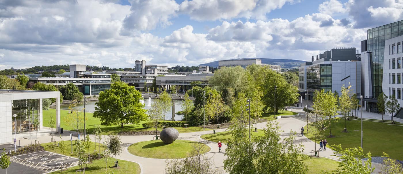 Parkland and lake beside teaching buildings on the UCD Belfield campus