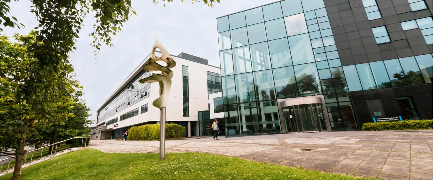 Entrance plaza of a UCD health sciences building with sculpture