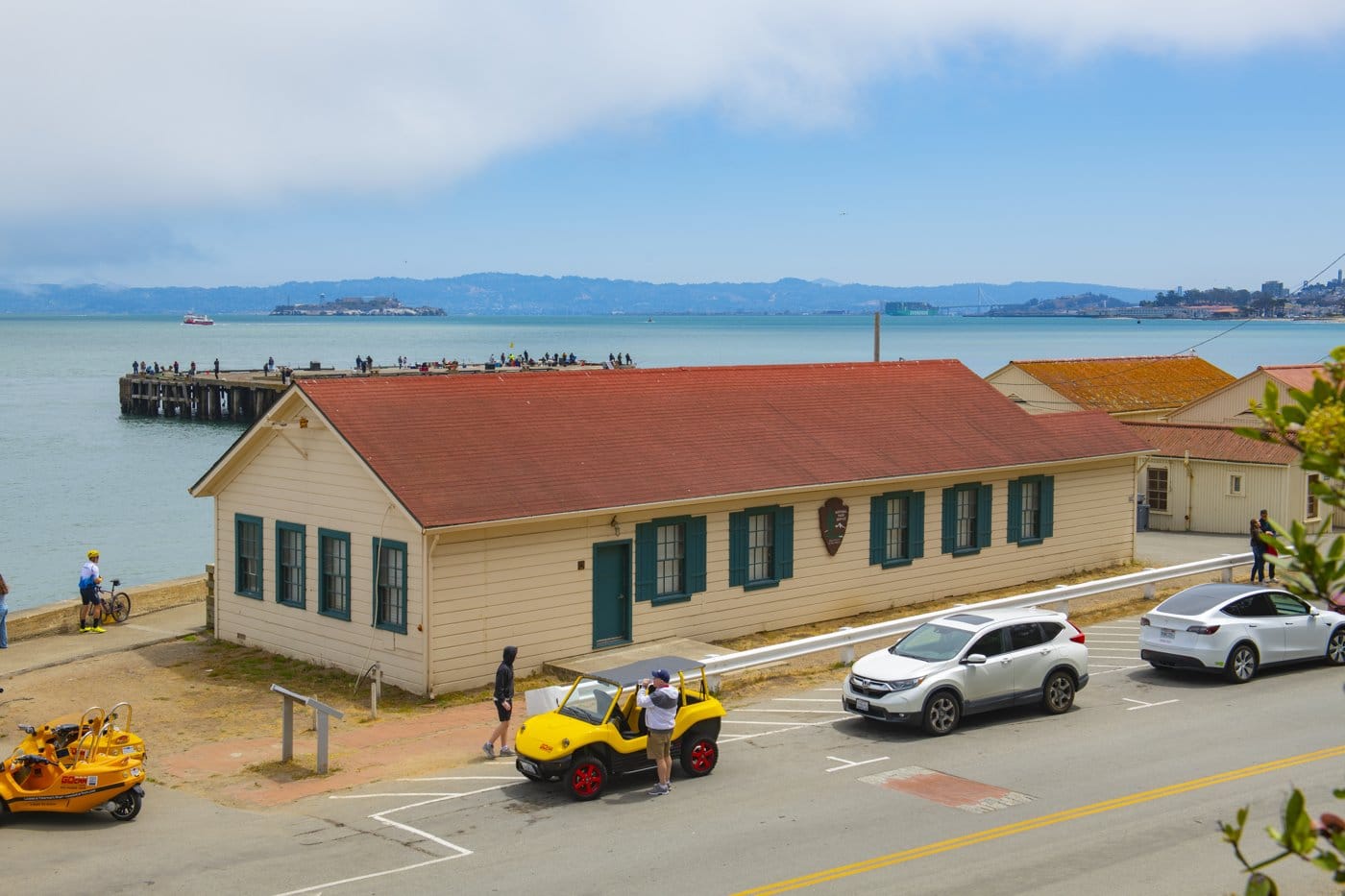 A historic waterfront building with people in San Francisco