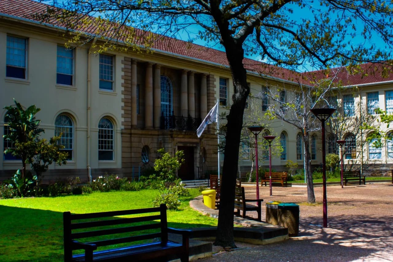 A sandstone columned University of Cape Town building with a courtyard, Cape Town, South Africa
