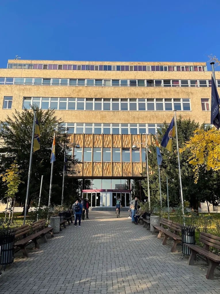 The entrance and flags of the University of Pécs Medical School