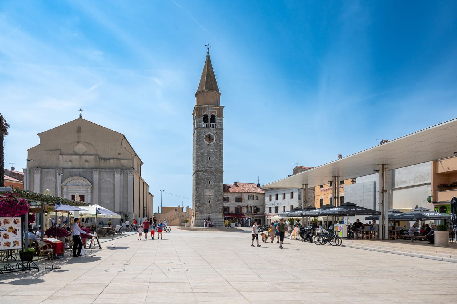 The main square and bell tower of a coastal town in Istria, the peninsula adjoining Rijeka, Croatia