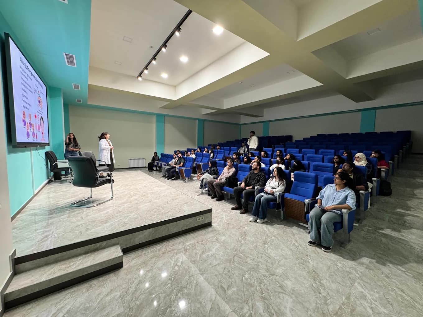 Students in a lecture hall at the University of Traditional Medicine