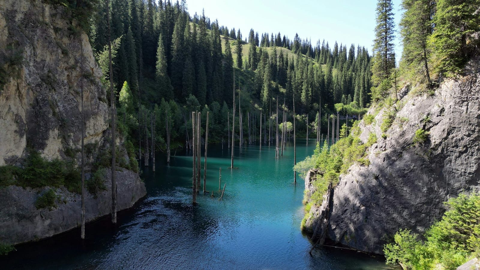 The Kaindy sunken-forest lake in the mountains of southern Kazakhstan (national scenery — not Aktobe)