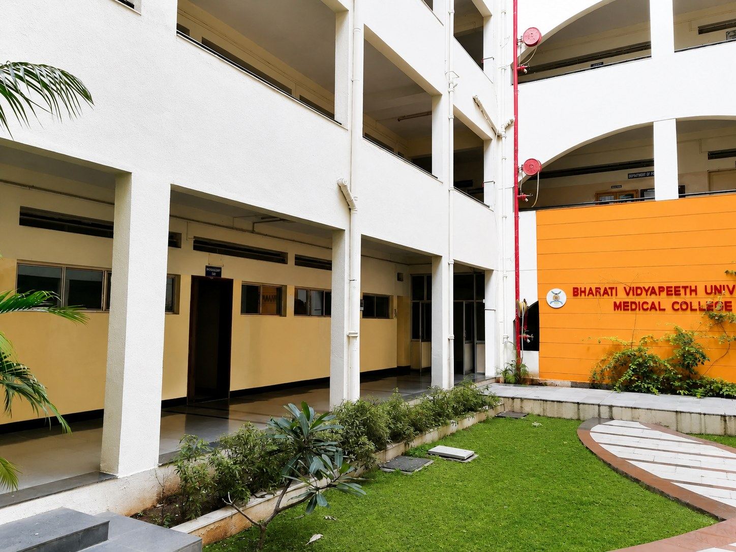A Bharati Vidyapeeth Medical College courtyard bearing the college name