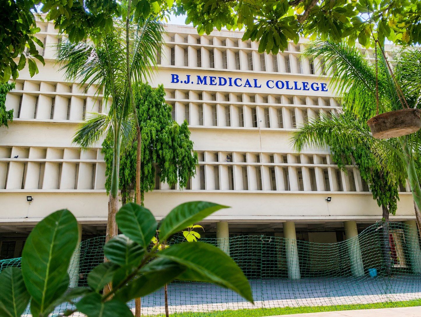 The B.J. Medical College, Ahmedabad building amid greenery