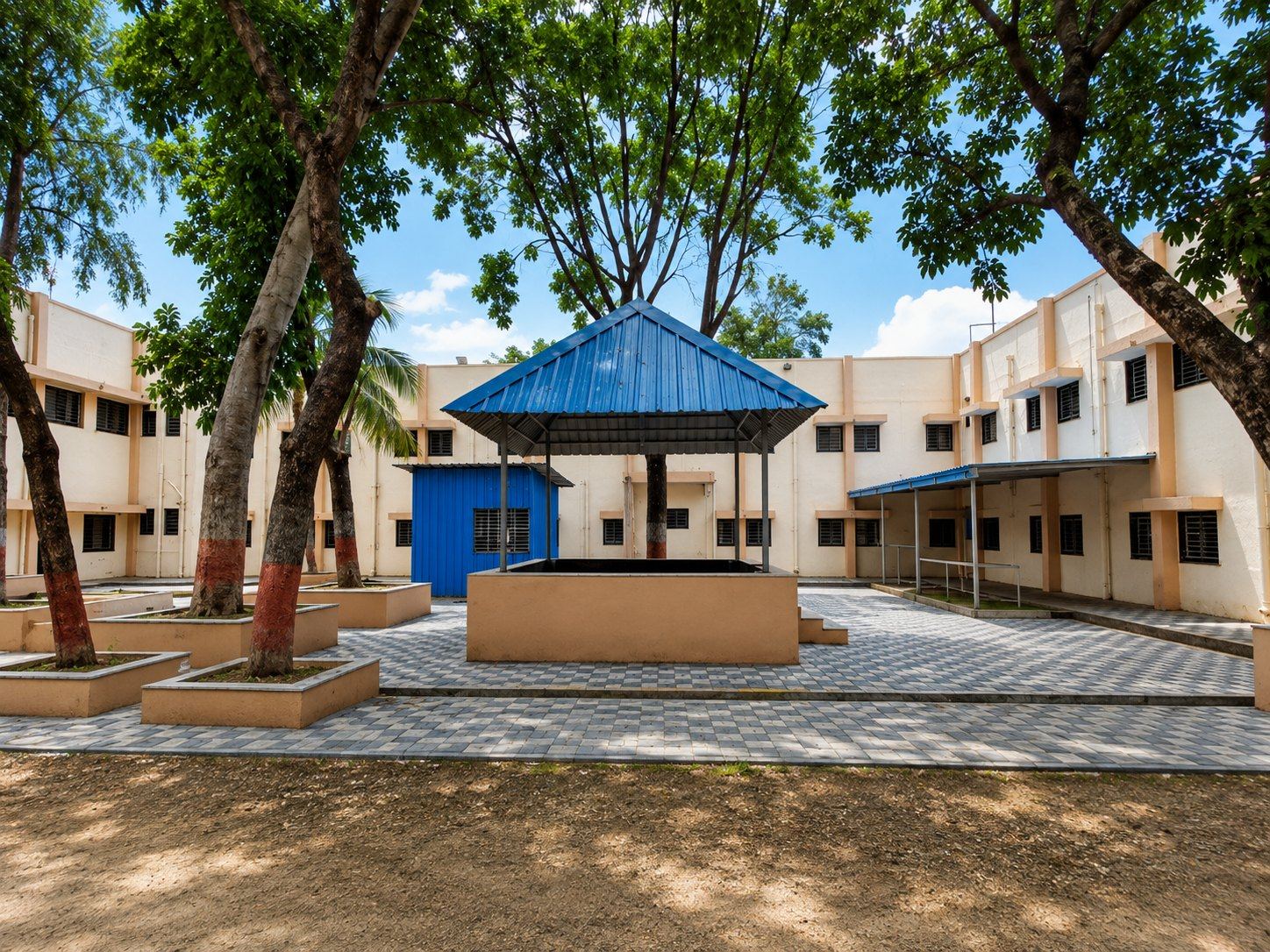 A courtyard with a gazebo at GMC Amravati