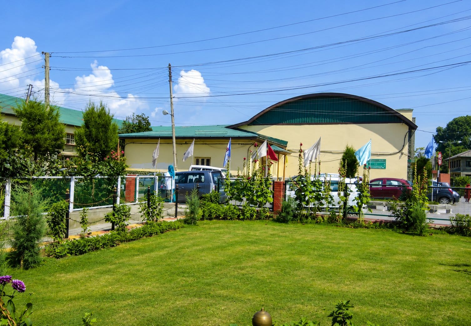 A green-roofed GMC Srinagar building