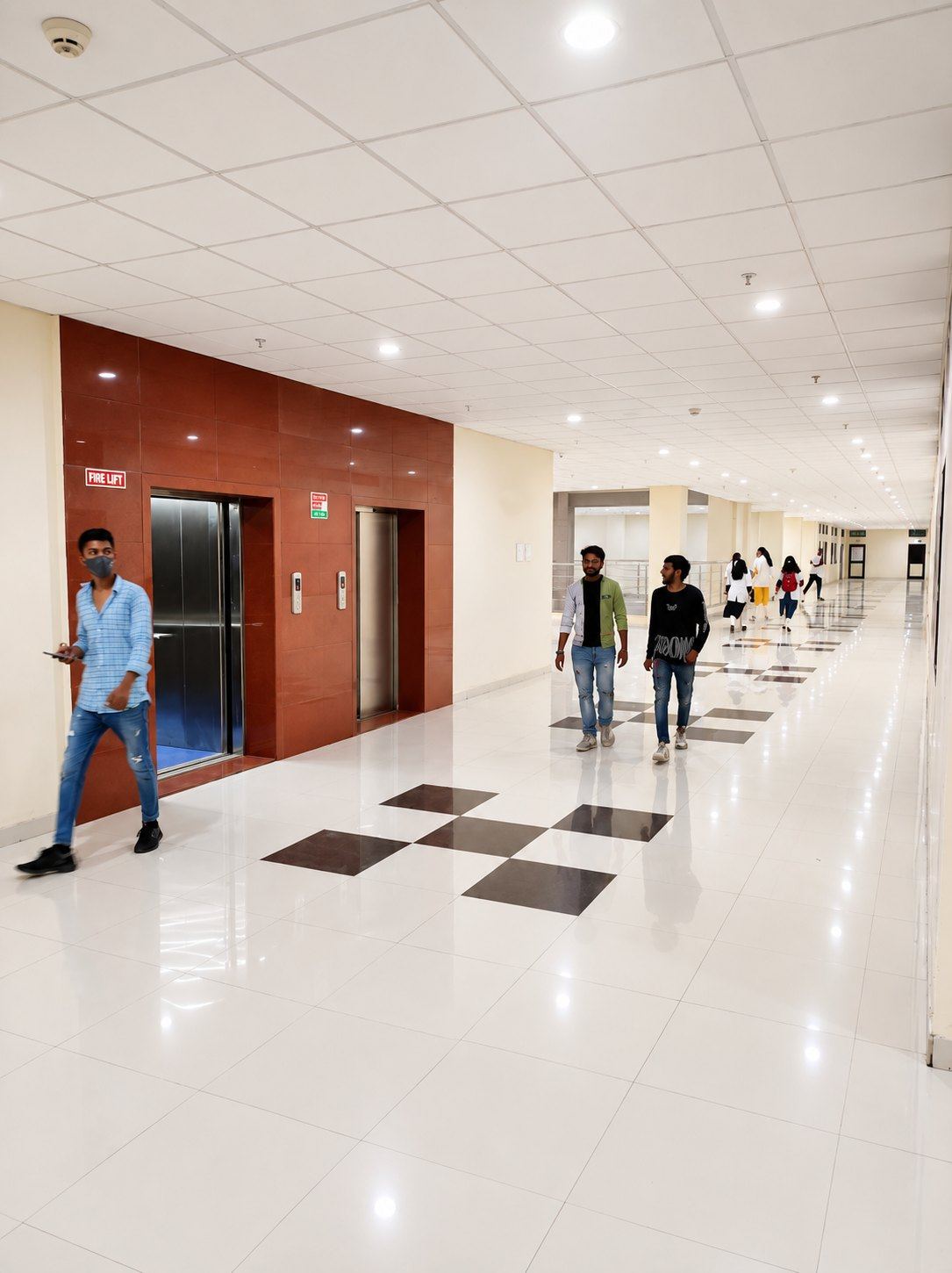 A corridor inside GMC Surat with students