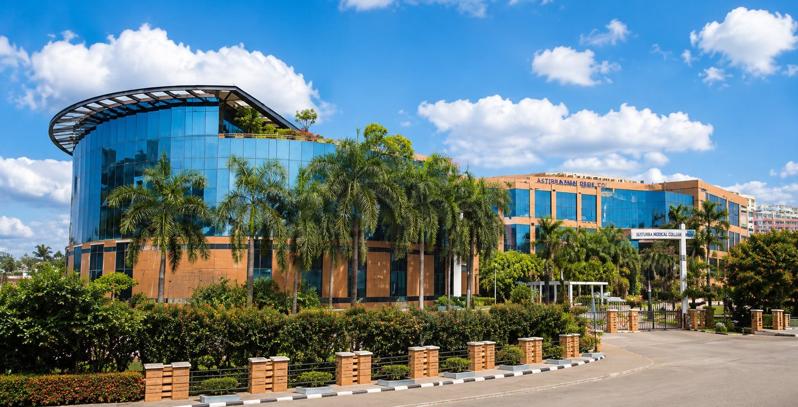 A modern academic building on the KMC Manipal campus