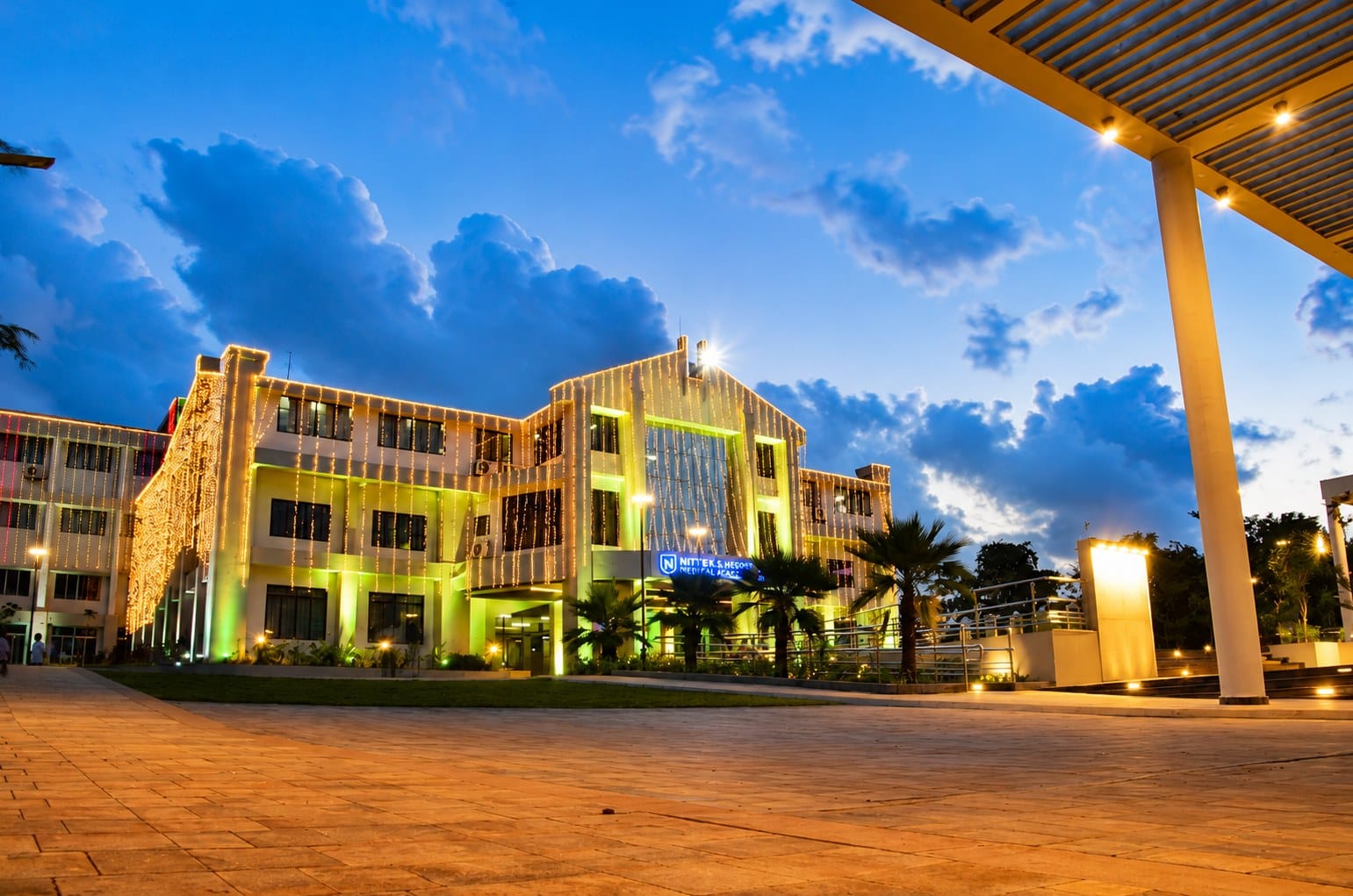 A KS Hegde Medical Academy building at dusk, Mangalore