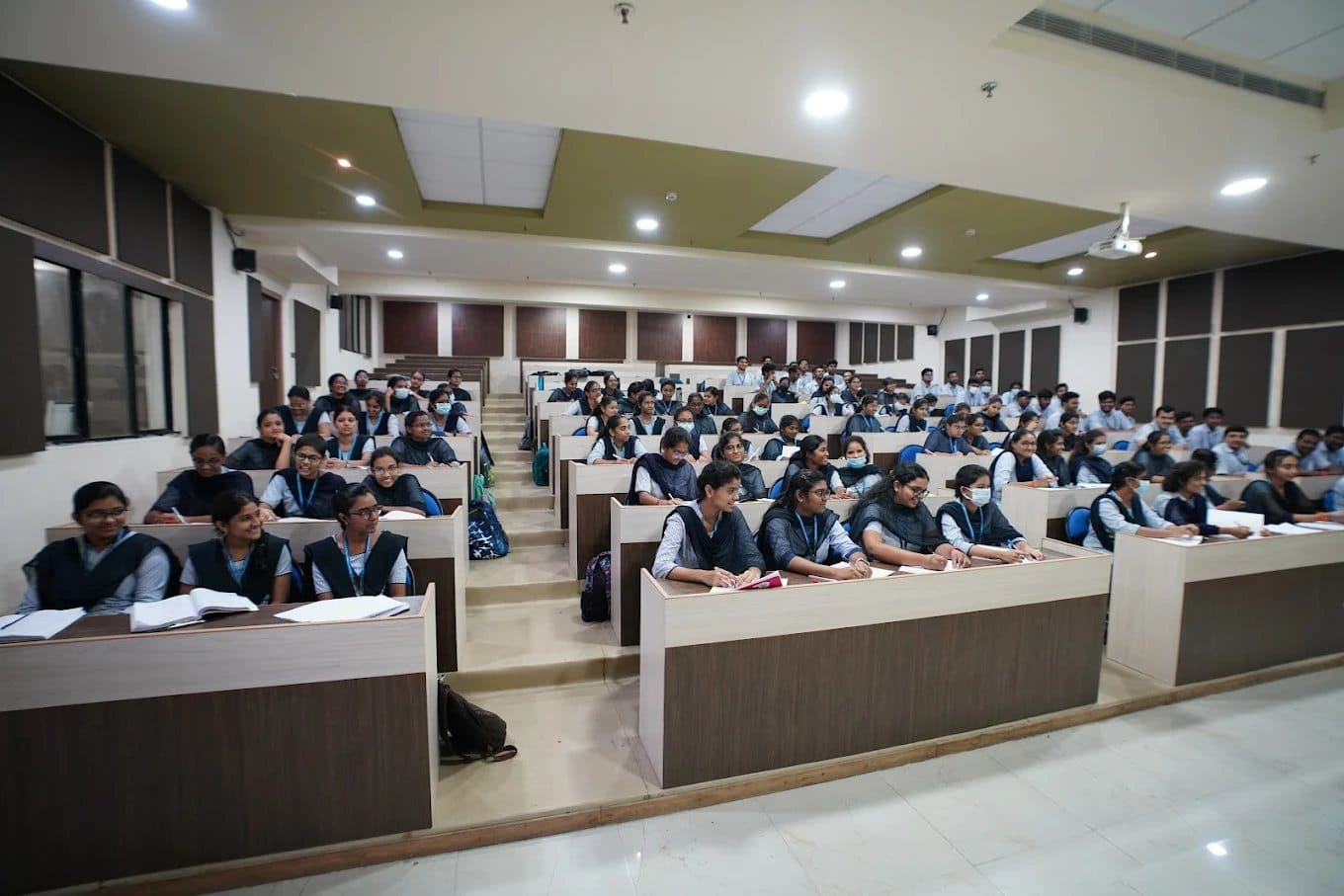 A lecture theatre with students at MIMS, Nellimarla