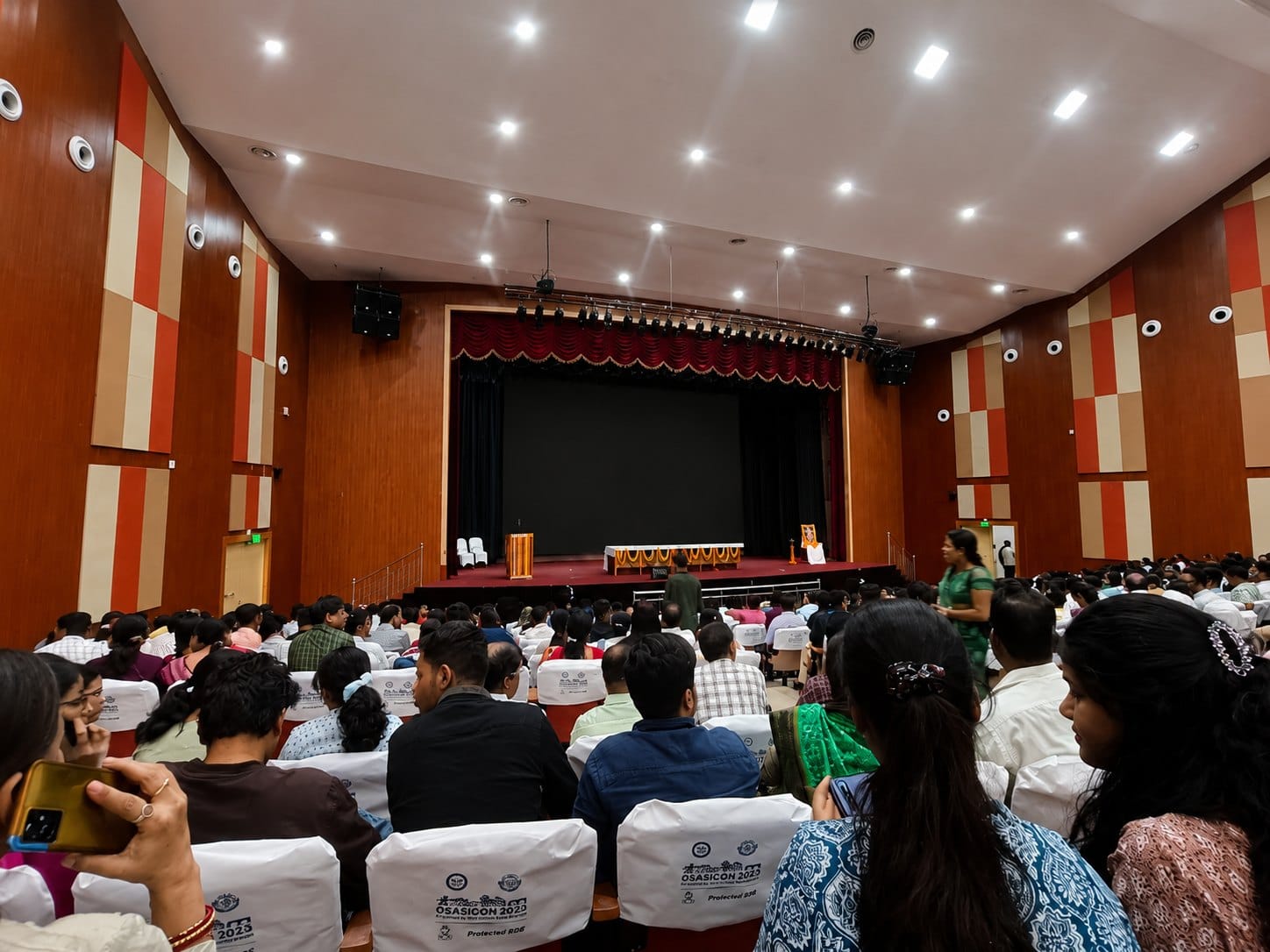 An auditorium event at SCB Medical College