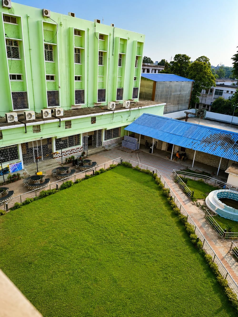 An SCB campus building with lawn