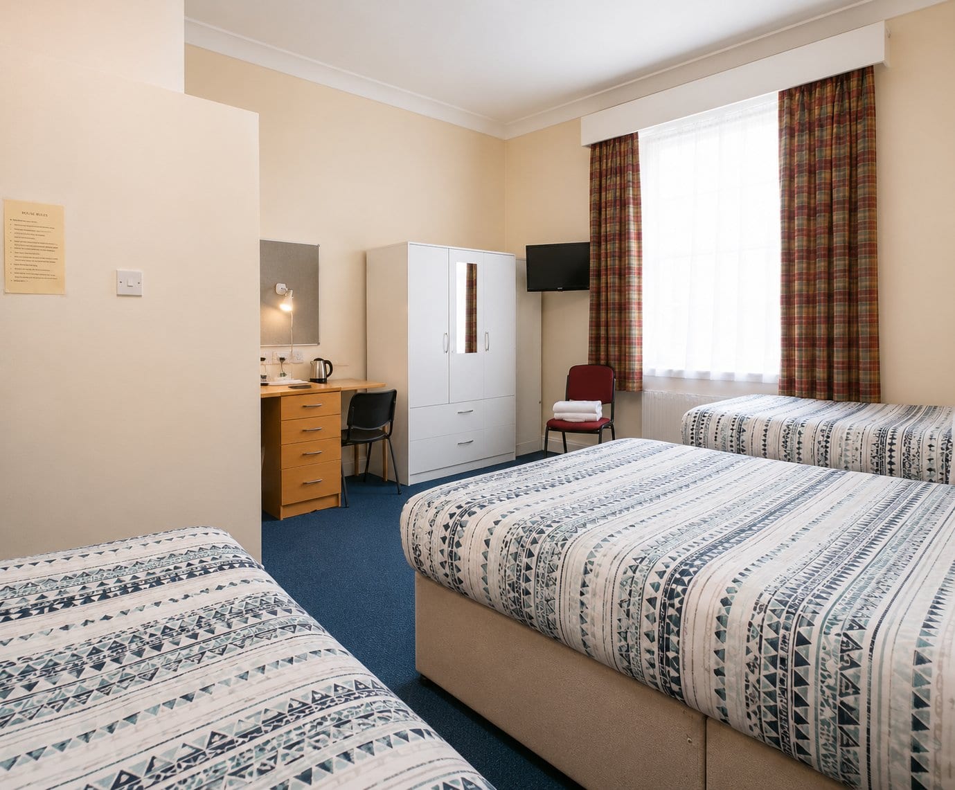 A furnished room in a Stanley hostel