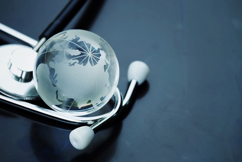Globe with stethoscope, MBBS abroad, glass globe