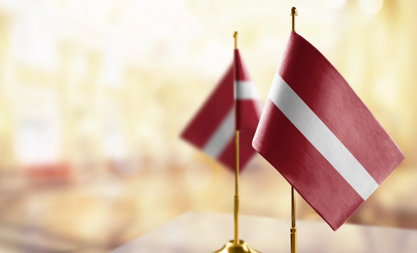 Small,Flags,Of,The,Latvia,On,An,Abstract,Blurry,Background MBBS in Latvia, European Union