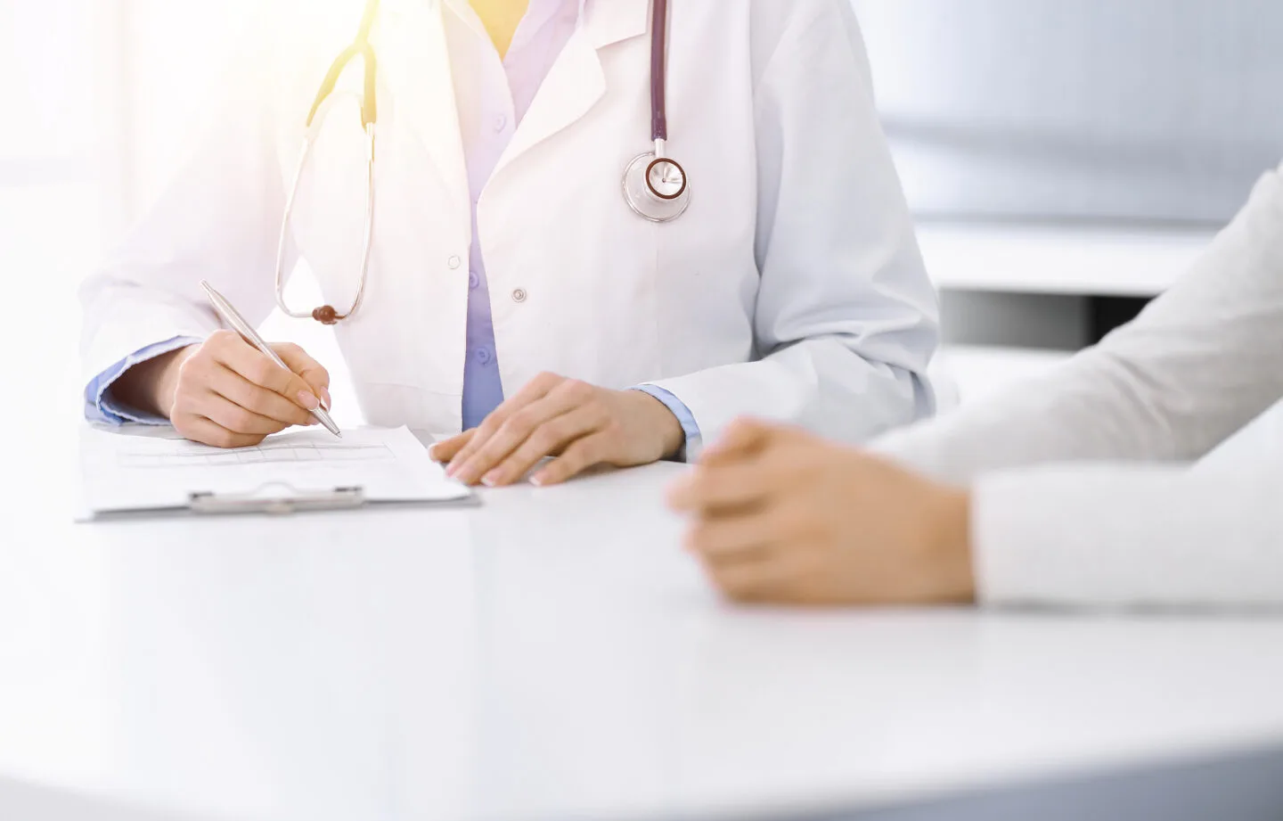 Unknown,Woman-doctor,And,Female,Patient,Sitting,And,Talking,At,Medical primary medical qualification -fmge exam pattern provisional registration minimum marks