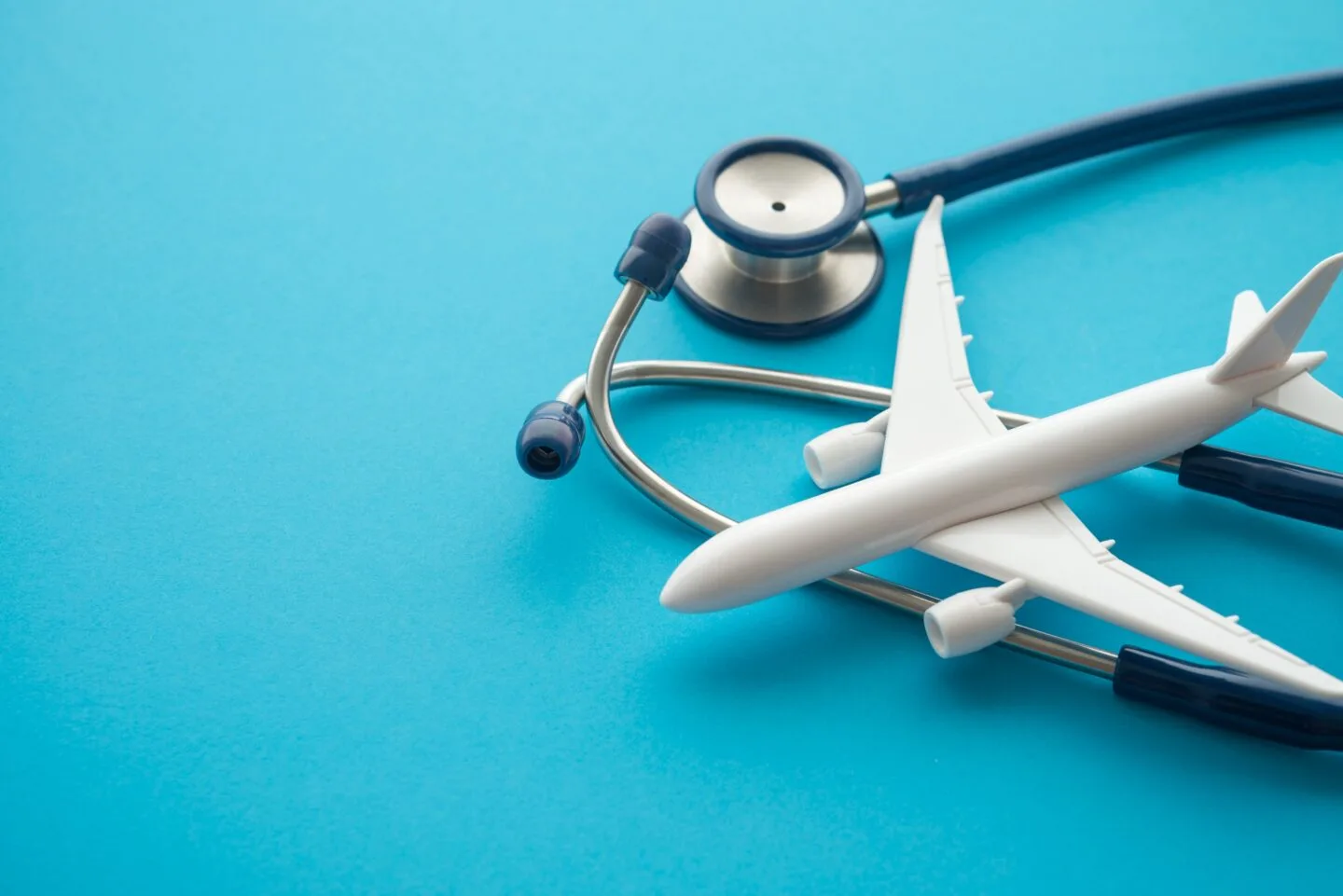Airplane,And,Stethoscope,On,Blue,Background,With,Copy,Space.,Going medicine and health sciences mbbs courses forensic medicine countries offer mbbs programs indian student compulsory subject-medical studies admission procedure