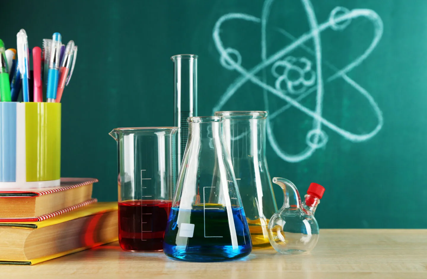 Desk,In,Chemistry,Class,With,Test,Tubes,On,Green,Blackboard teachers exams paper difficulty doubt high score reference book exam study materials national testing agency entrance exam- national eligibility